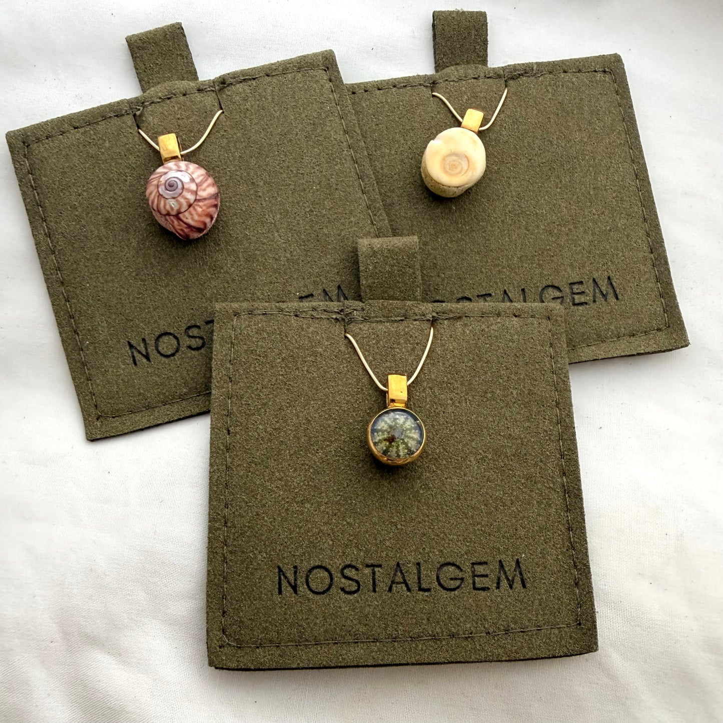 Single Shell Pendants: Kina, Cat's Eye, Kota