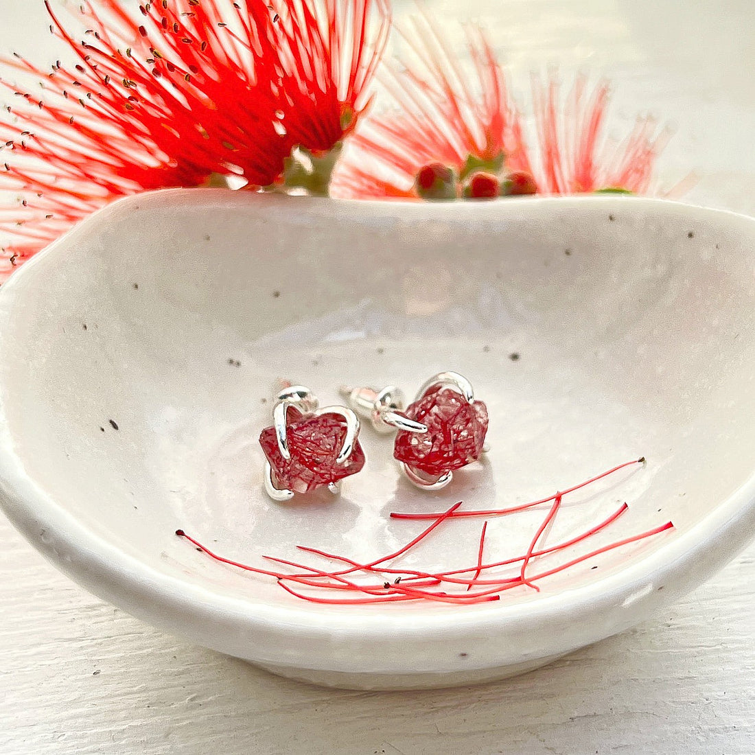 Our Pohutukawa Floragem Stud Earrings in silver claw settings are back!