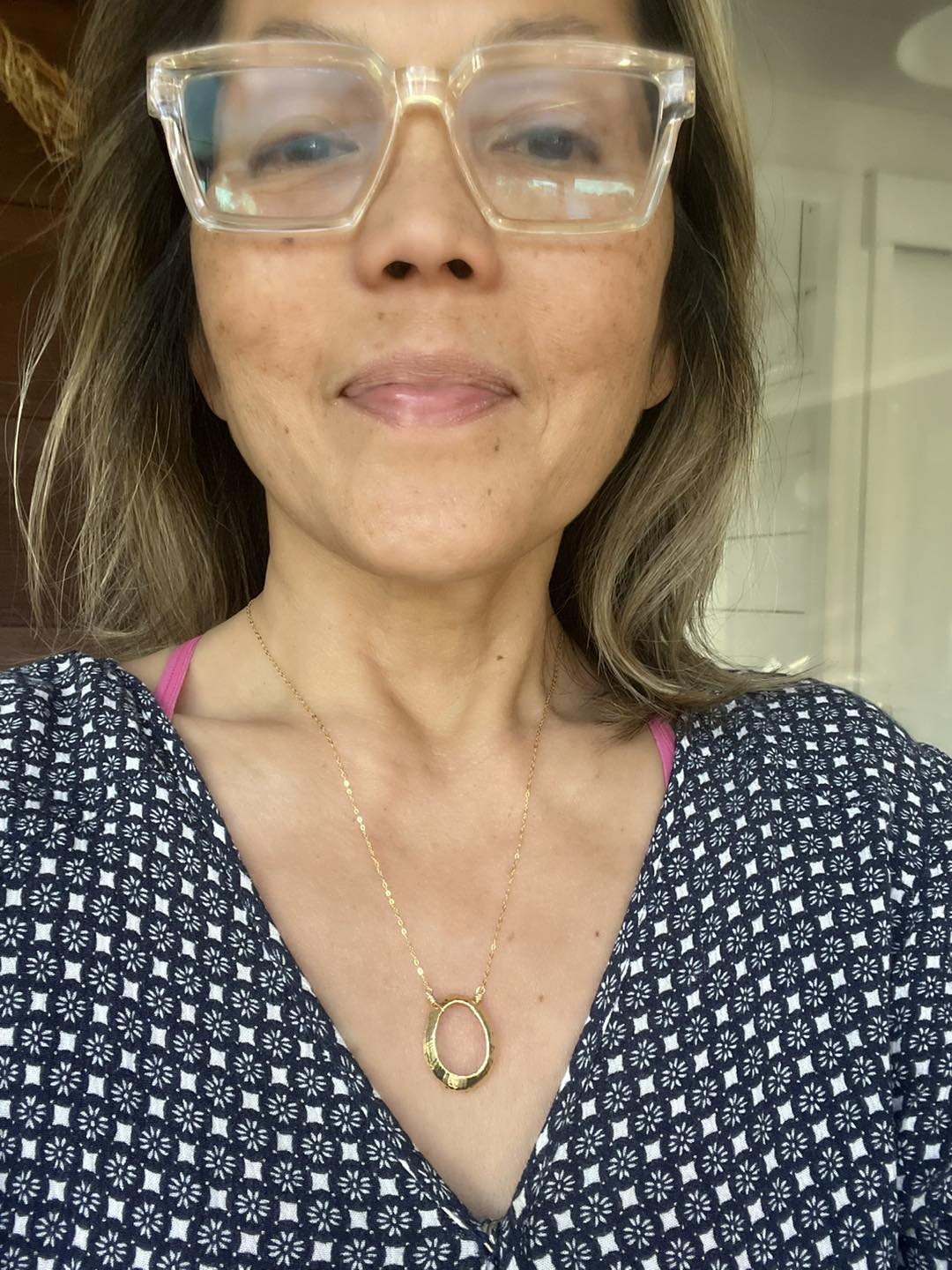 I'm loving this new necklace so much I want to keep it.