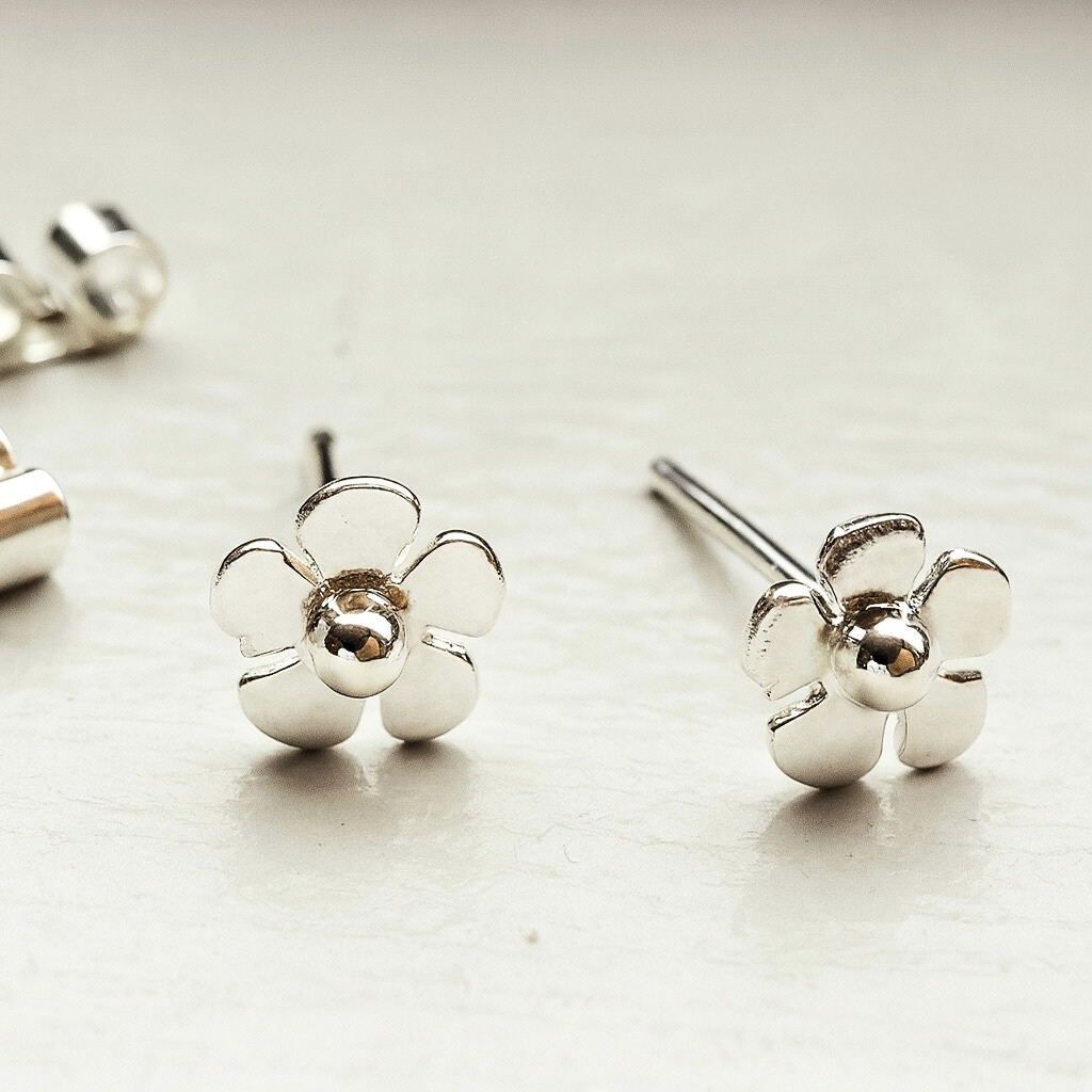 Tiny mānuka studs in sterling silver