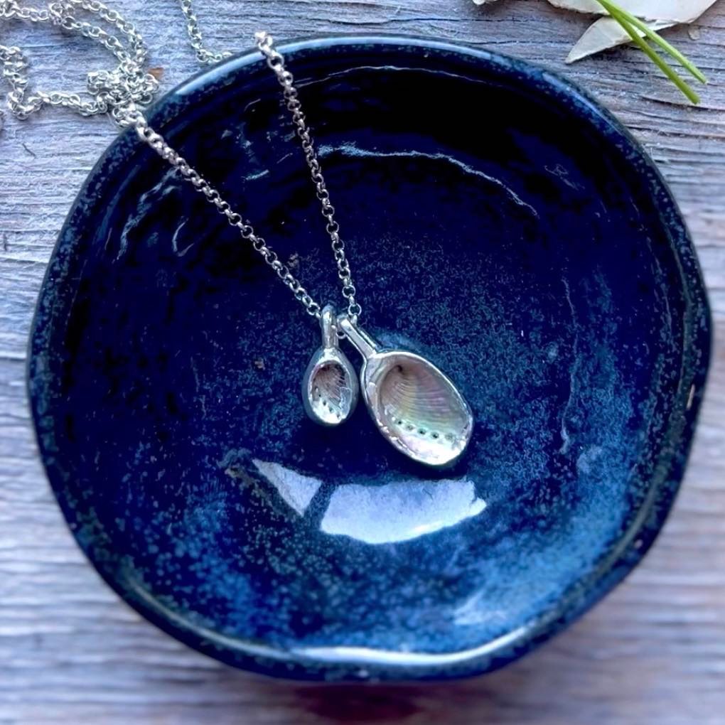 Who’s waiting for this silver dipped mother and child Paua shell necklace?