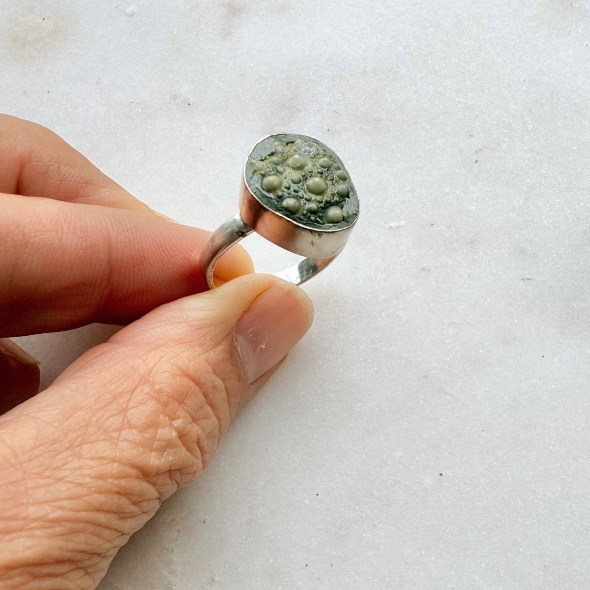 Broken Kina Sterling Silver Ring