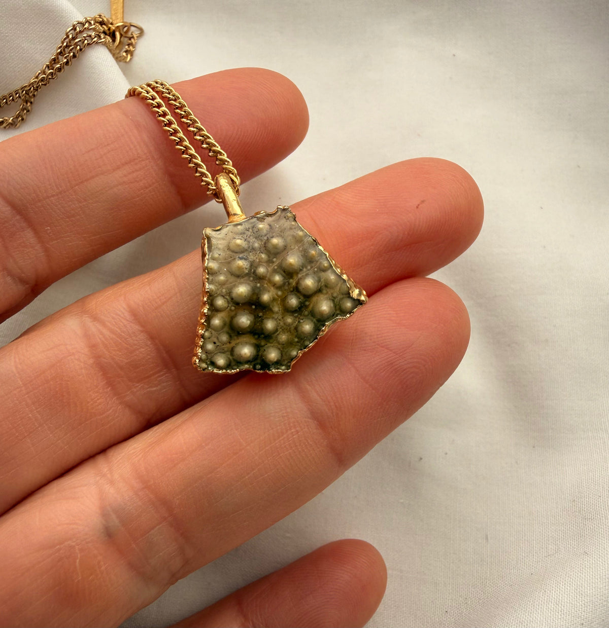 Broken kina shell fragment necklace, natural shell variation