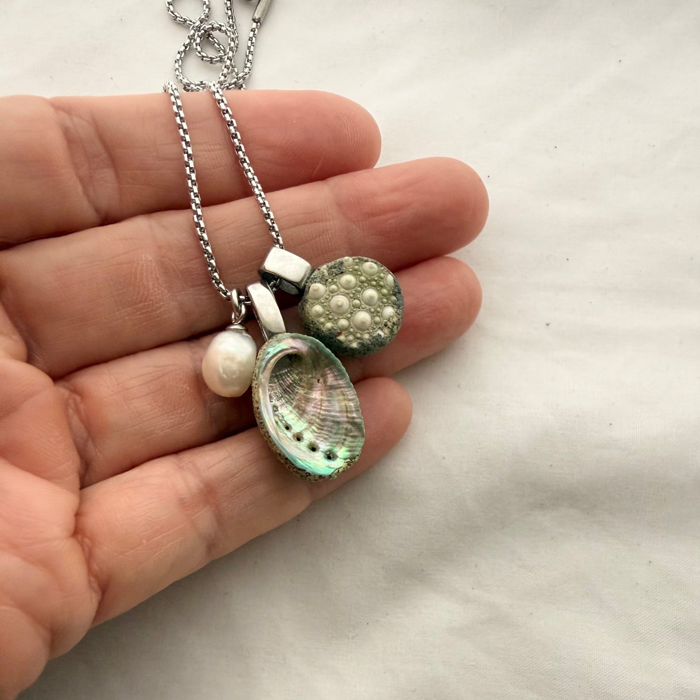 Shell Story Trio Necklace: Pearl, Paua, Broken Kina
