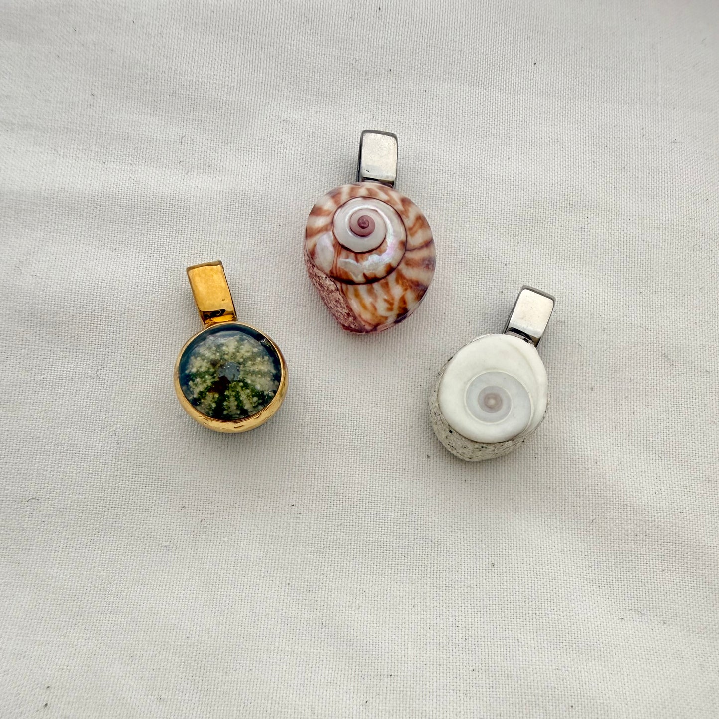 Single Shell Pendants: Kina, Cat's Eye, Kota
