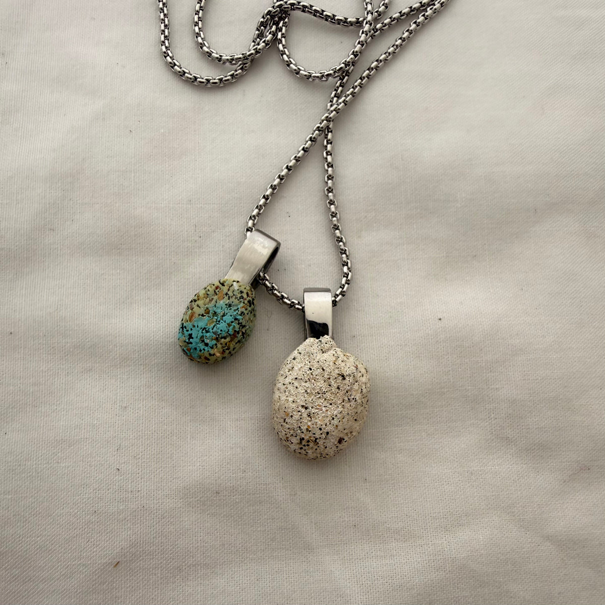 Cat's eye and paua shell necklace worn on model