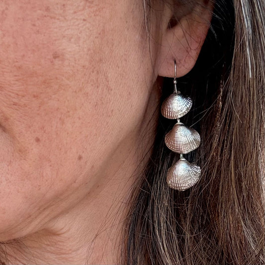Cockle shell drop earrings close-up detail