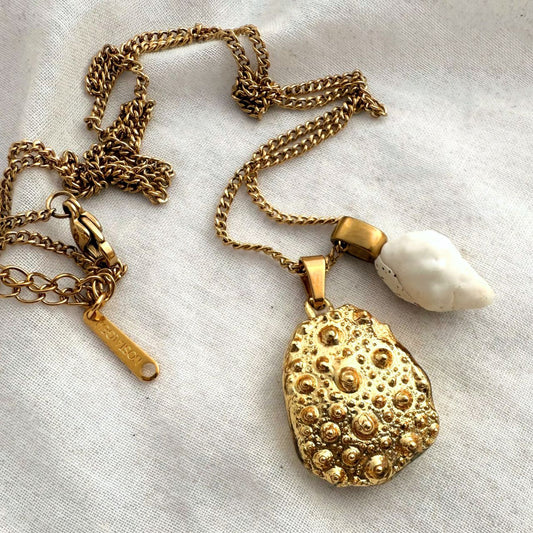 Tides and Tales necklace broken kina and whelk shell, handmade New Zealand jewellery