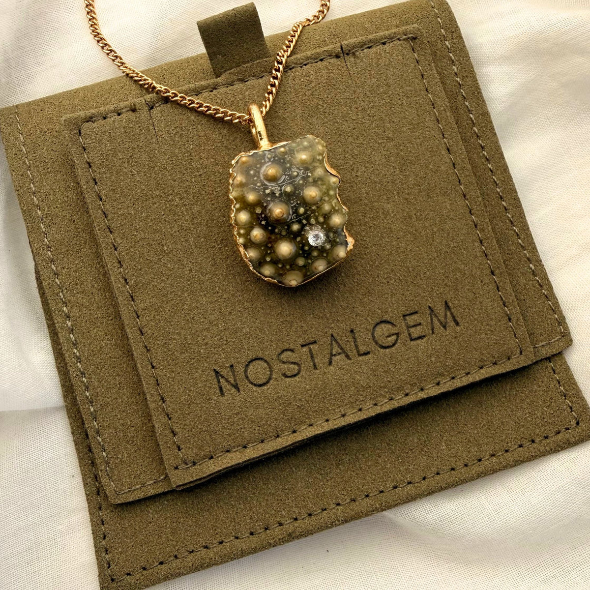 Broken kina shell fragment necklace variant options