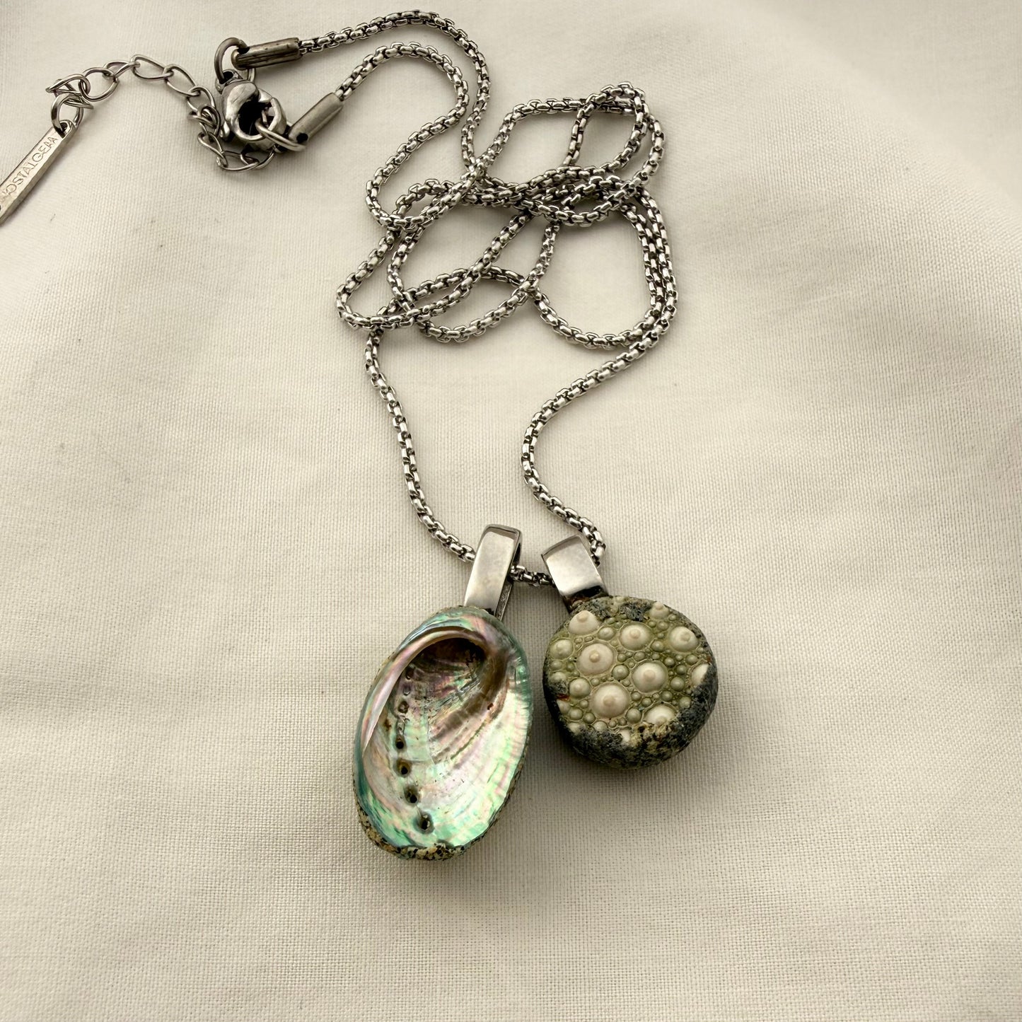 Paua and broken kina shell pair necklace worn, handmade New Zealand jewellery