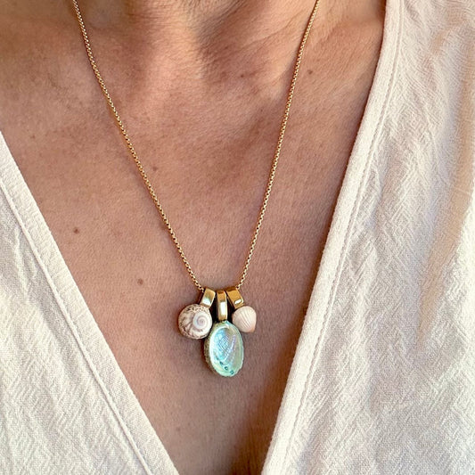 Paua wheel and cockle shell trio necklace close-up detail