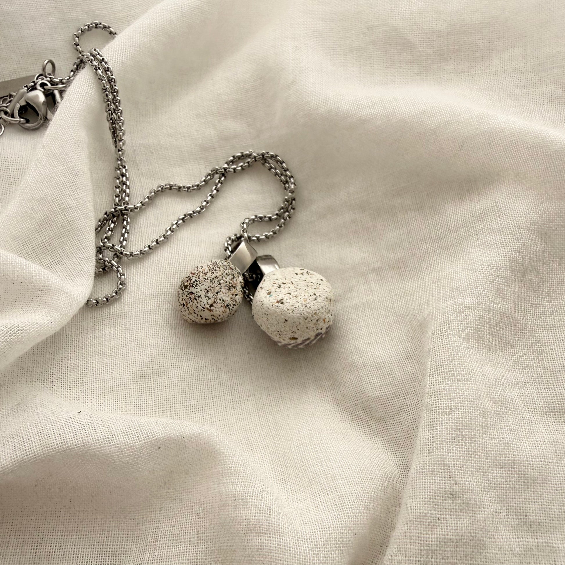 Koru spiral shell necklace styled shot
