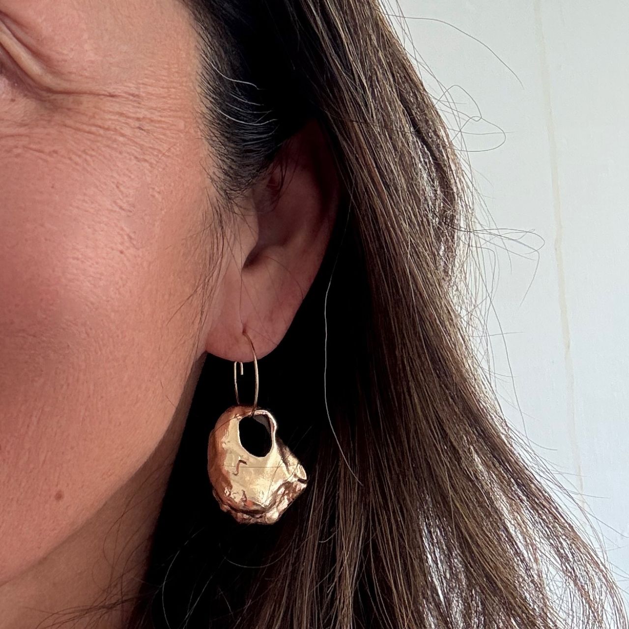 Broken oyster shell earrings pair