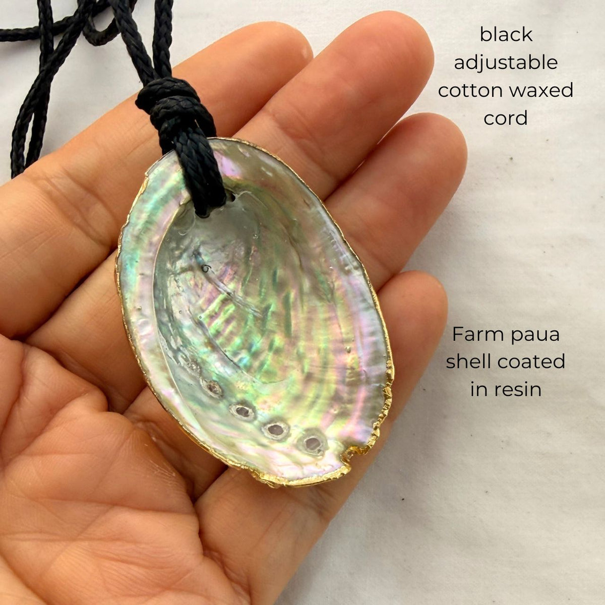 Paua shell cord necklace close-up detail