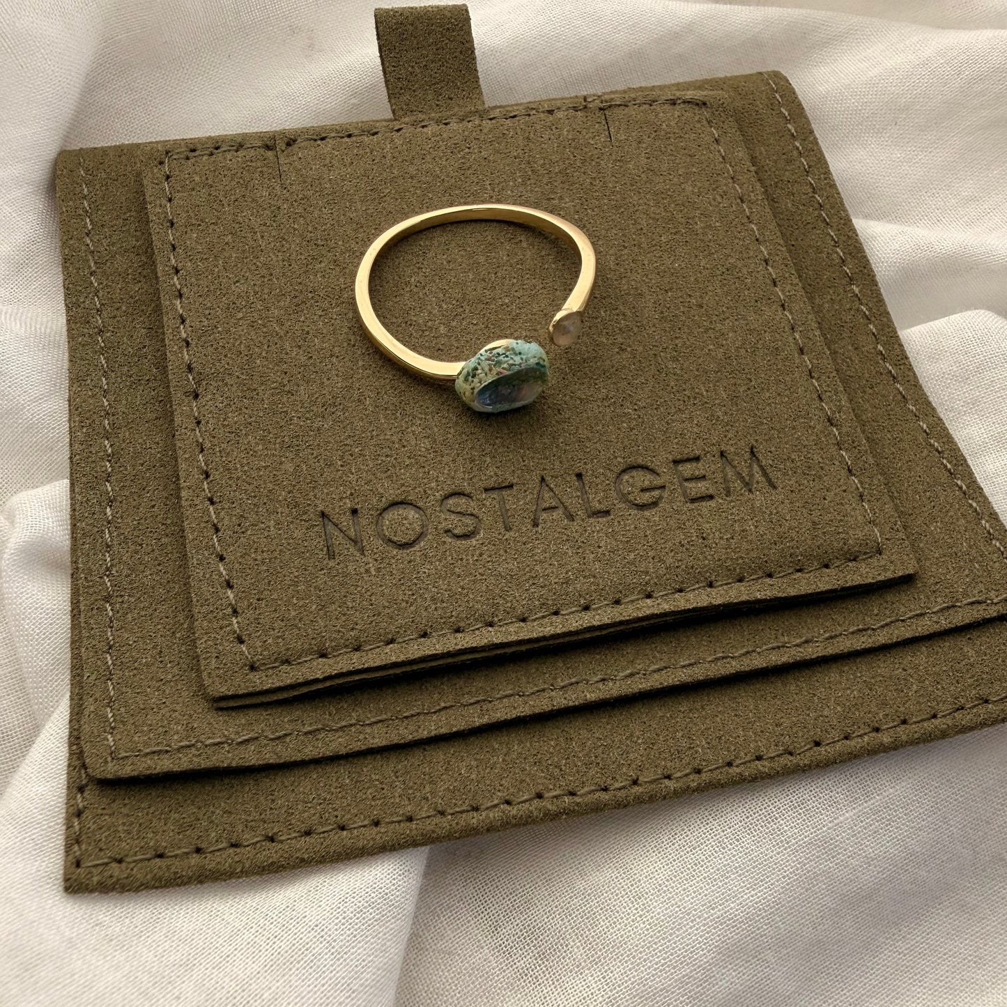 Paua and sand dome ring cuff styled on model
