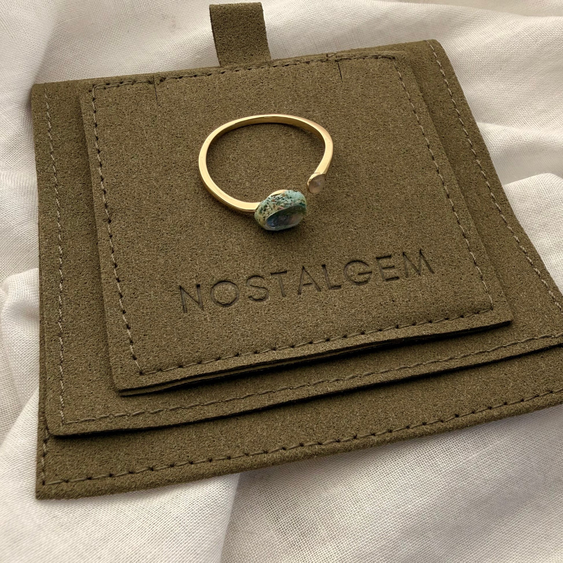 Paua and sand dome ring cuff styled on model