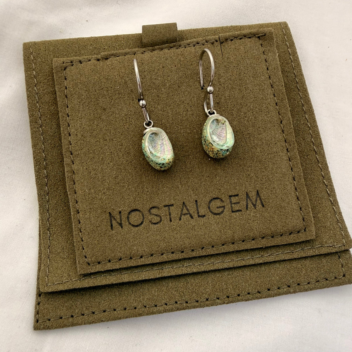 Paua shell dangle hook earrings in micro-suede gift pouch