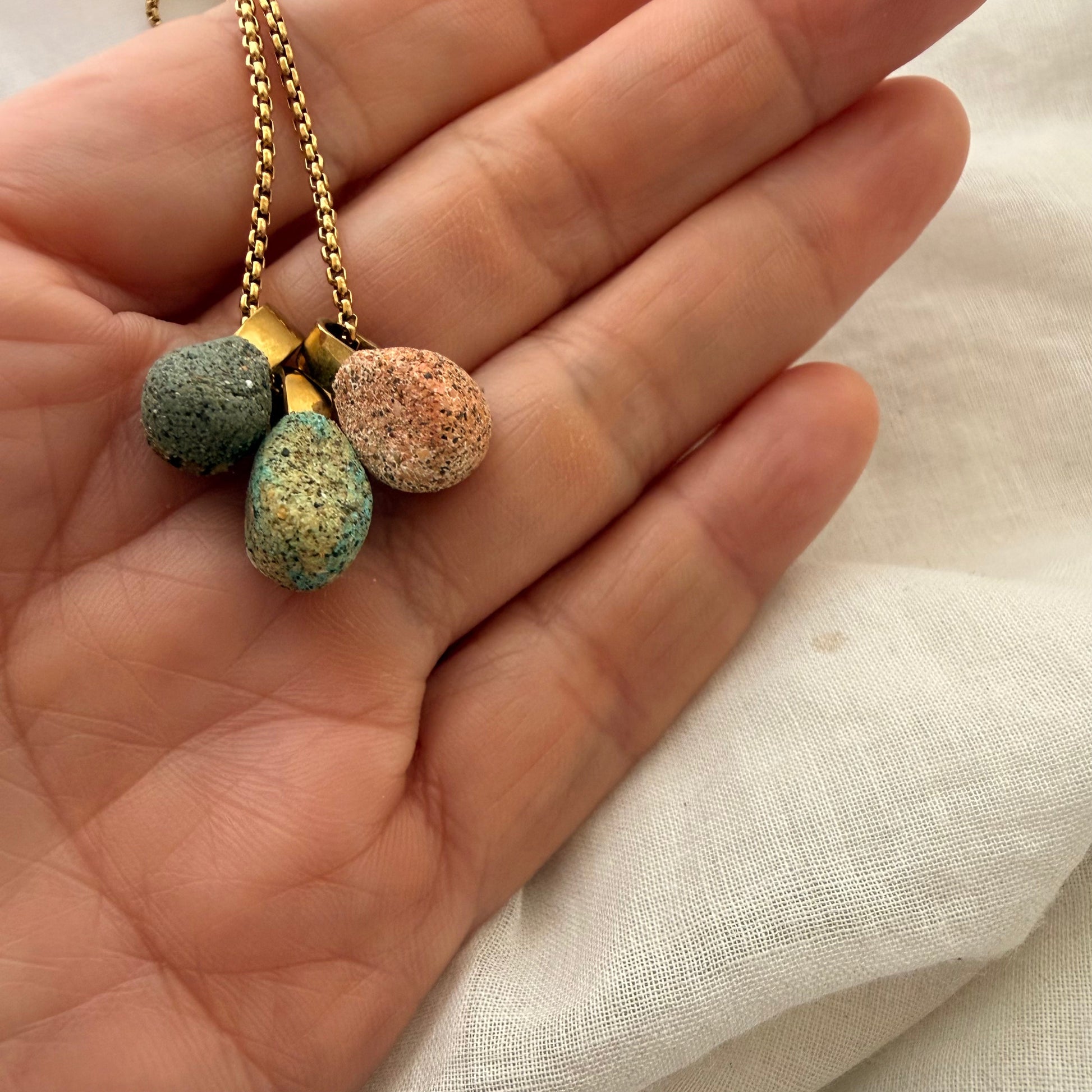 Paua wheel and kina shell trio necklace styled shot