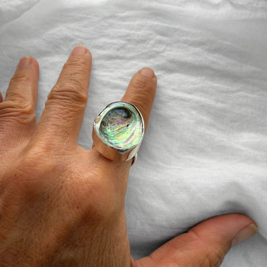 Large paua shell ring close-up detail
