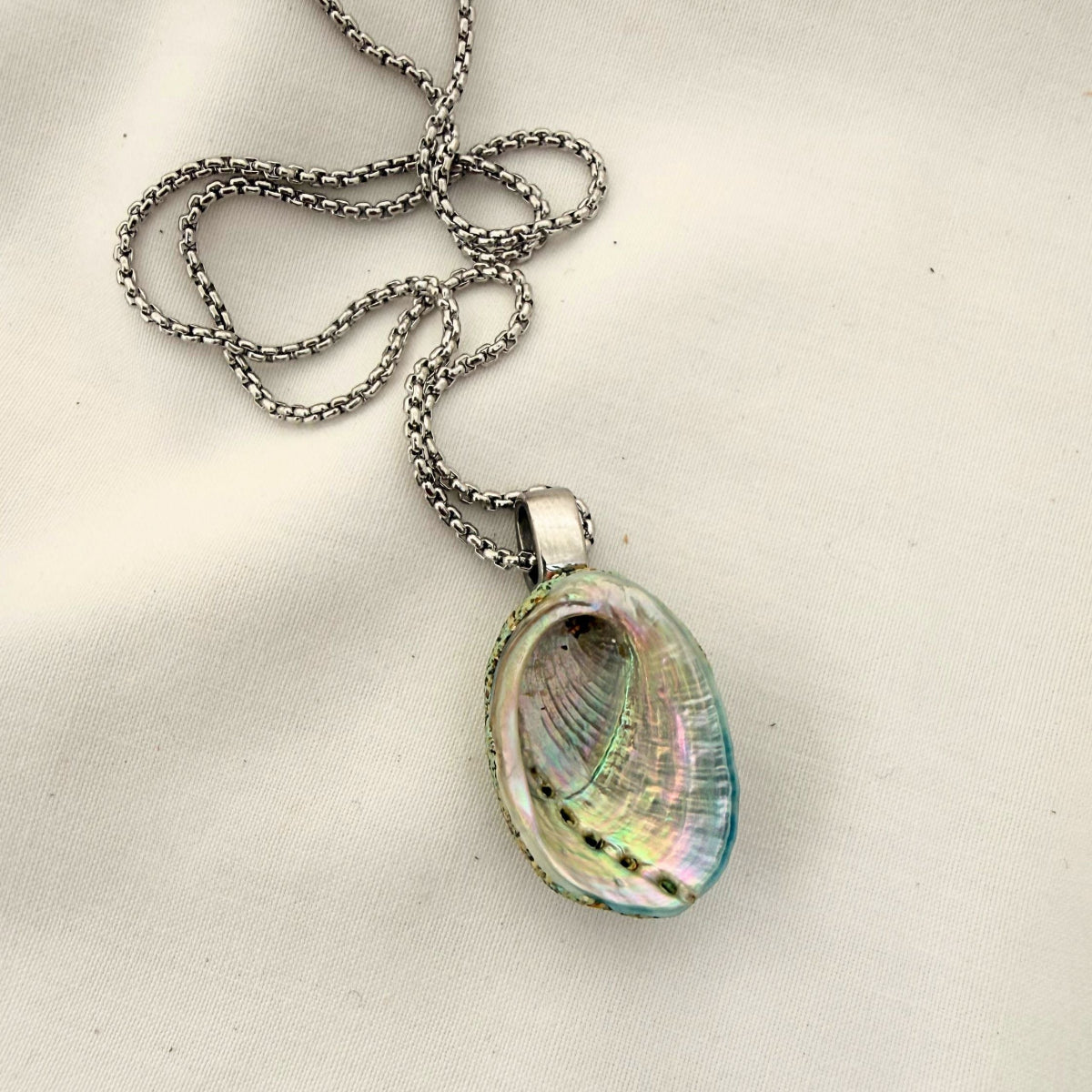 Paua shell single pendant necklace worn, handmade New Zealand jewellery