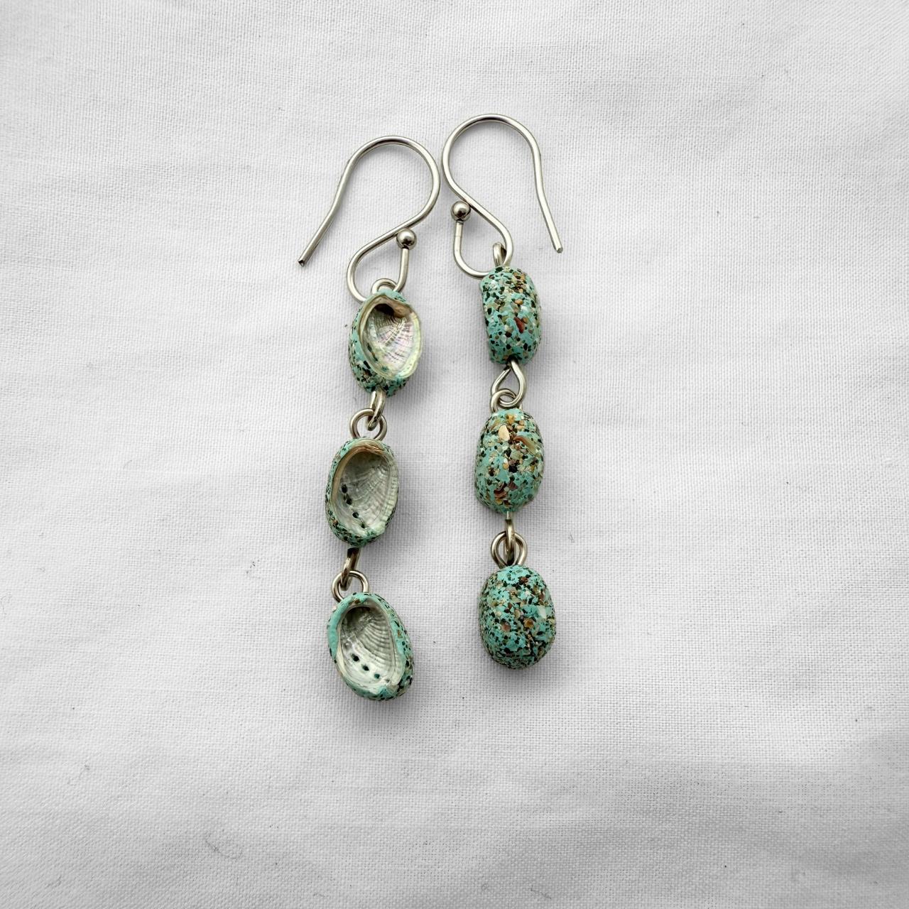 Paua trio chandelier earrings worn on model