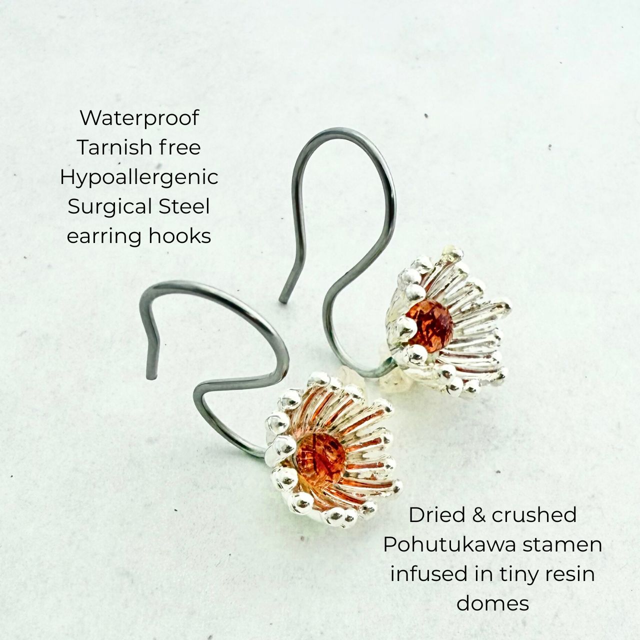 Pohutukawa floragem earrings worn on model