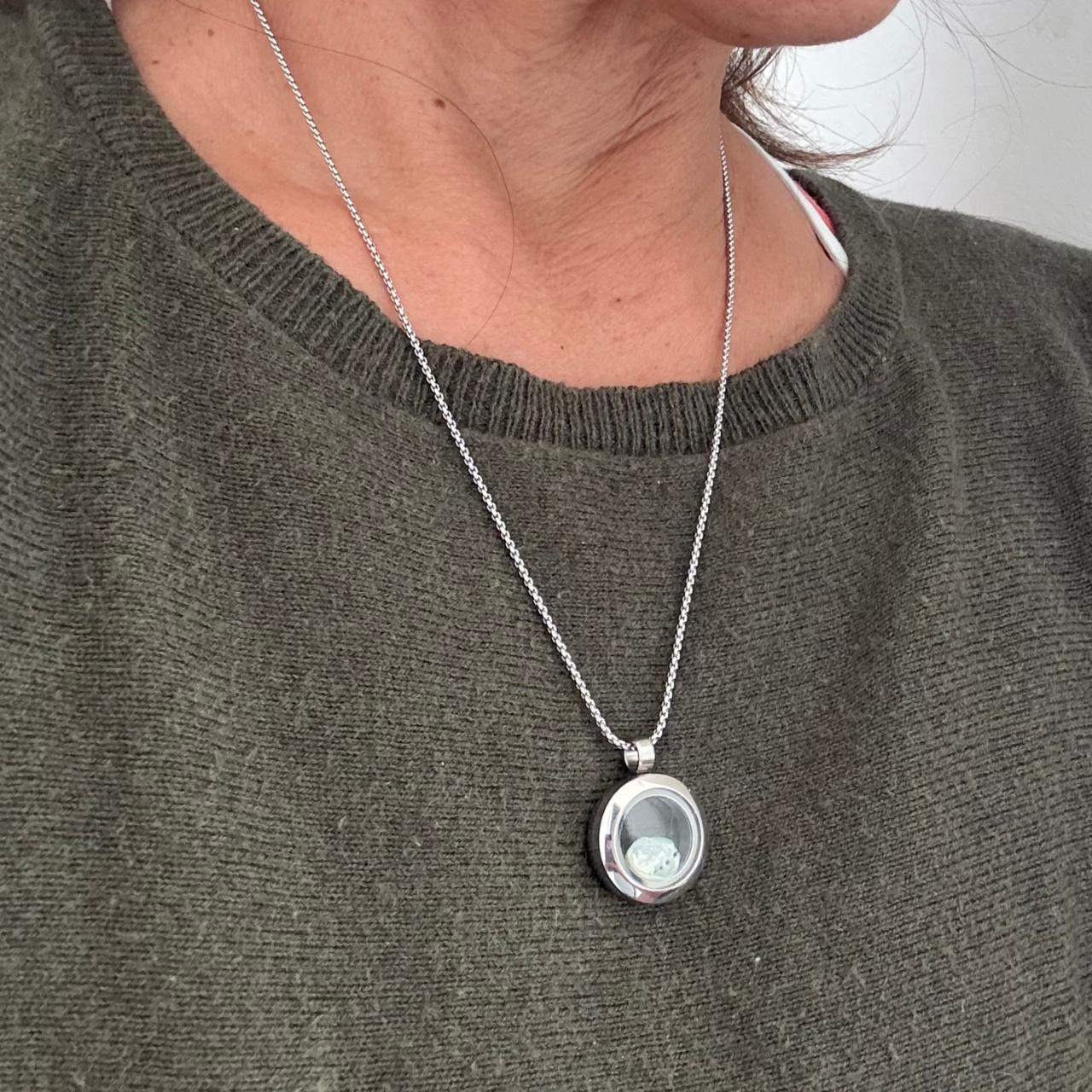Story keeper locket necklace close-up detail