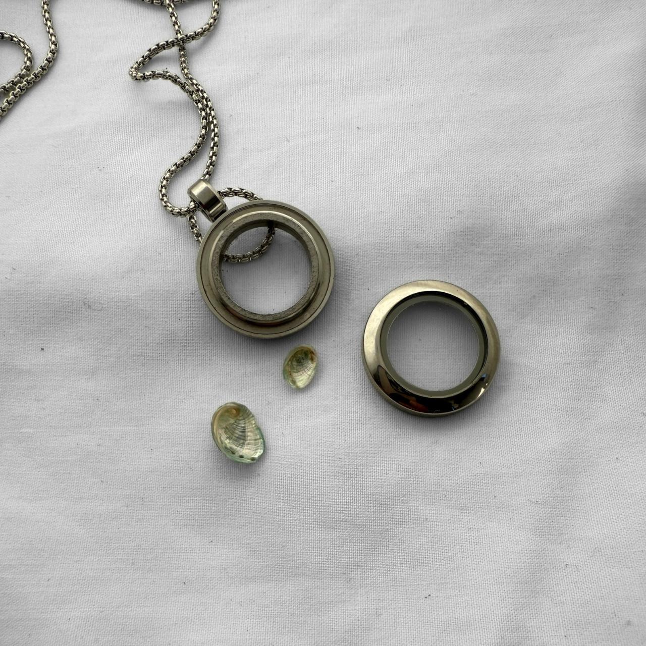 Story keeper locket necklace open showing paua shell