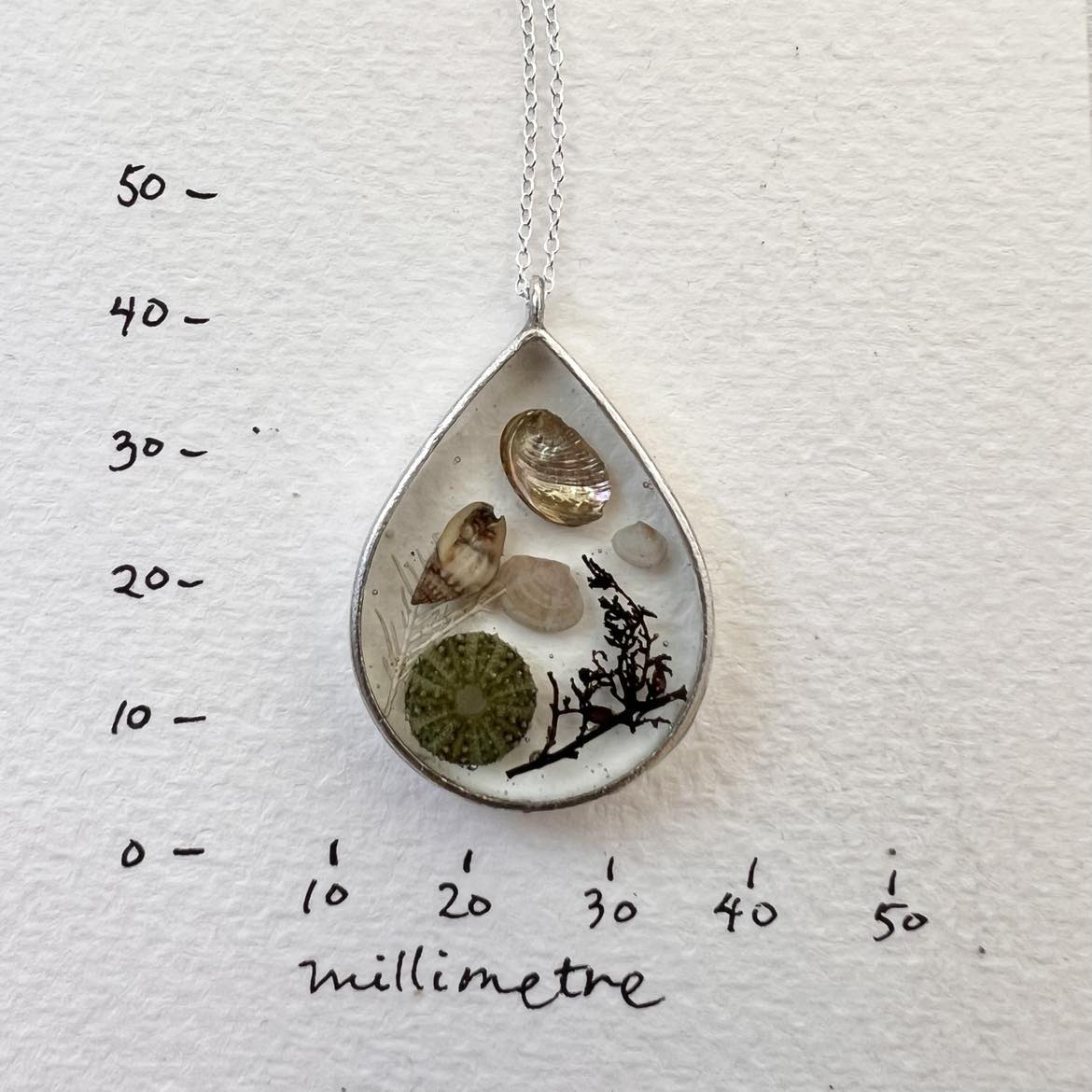 Tiny Tidal Treasures Teardrop Pendant With Tiny Kina Silver Necklace 4