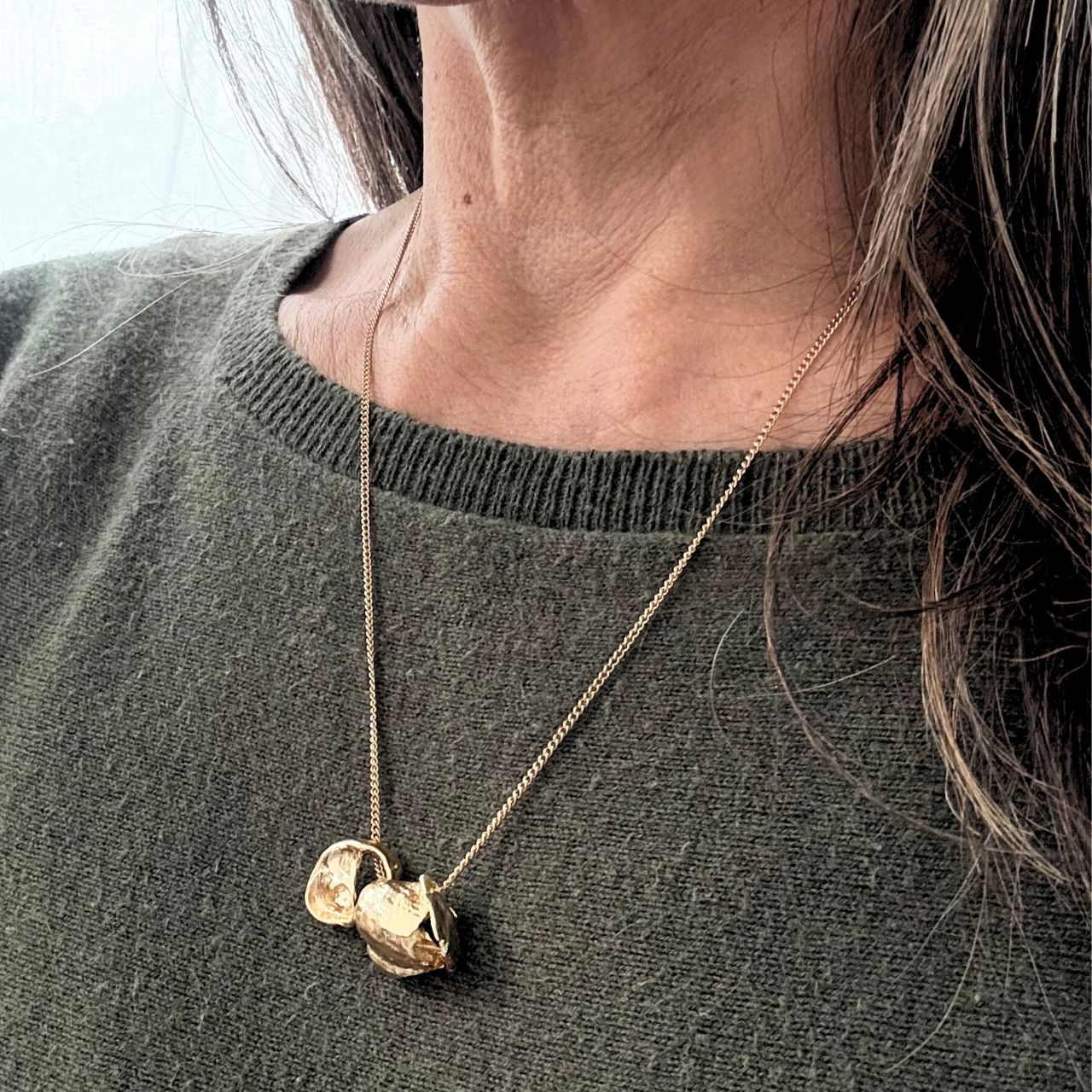 Tide-worn shell trio necklace close-up detail